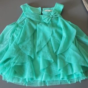 Ruffled sheer tank top.